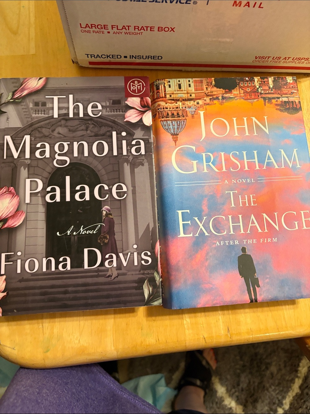 The Magnolia Palace & The Exchange hardcover books - multicolor covers